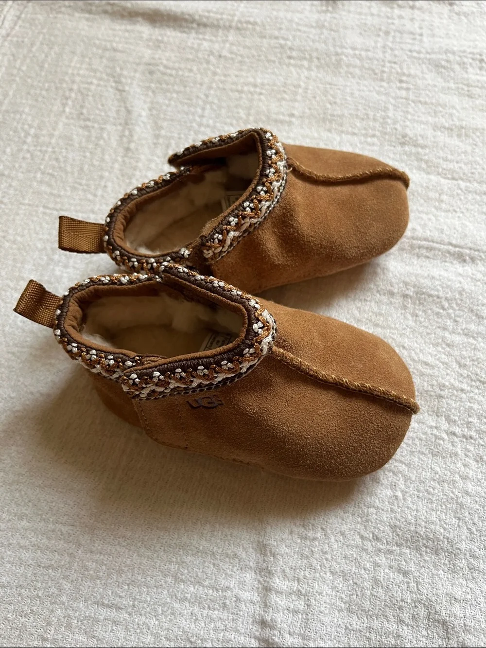 UGG Baby Chestnut Brown Suede Sheepskin Lined Slippers with Beaded Trim